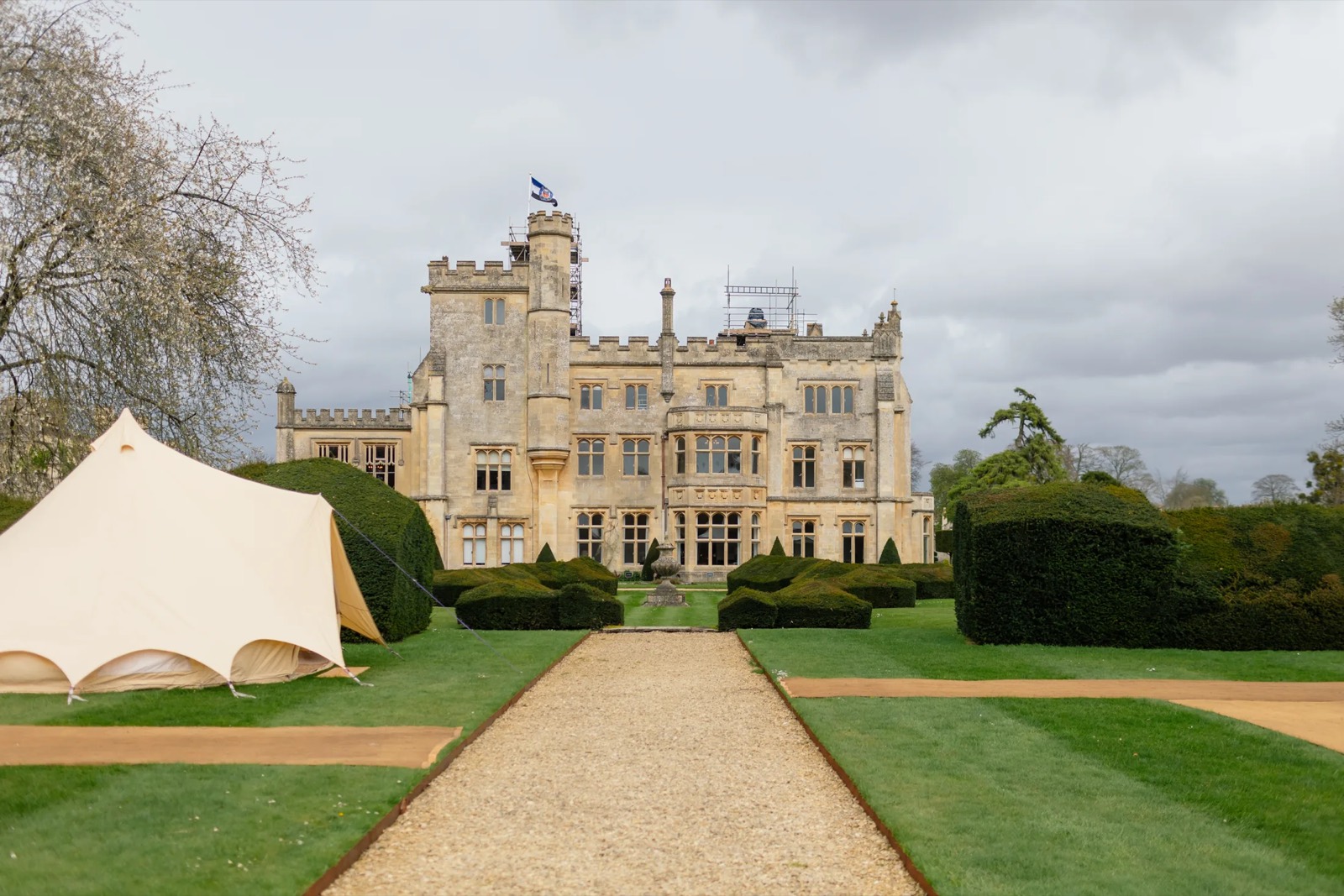 Bell tents set up on a wedding venue lawn in the South West