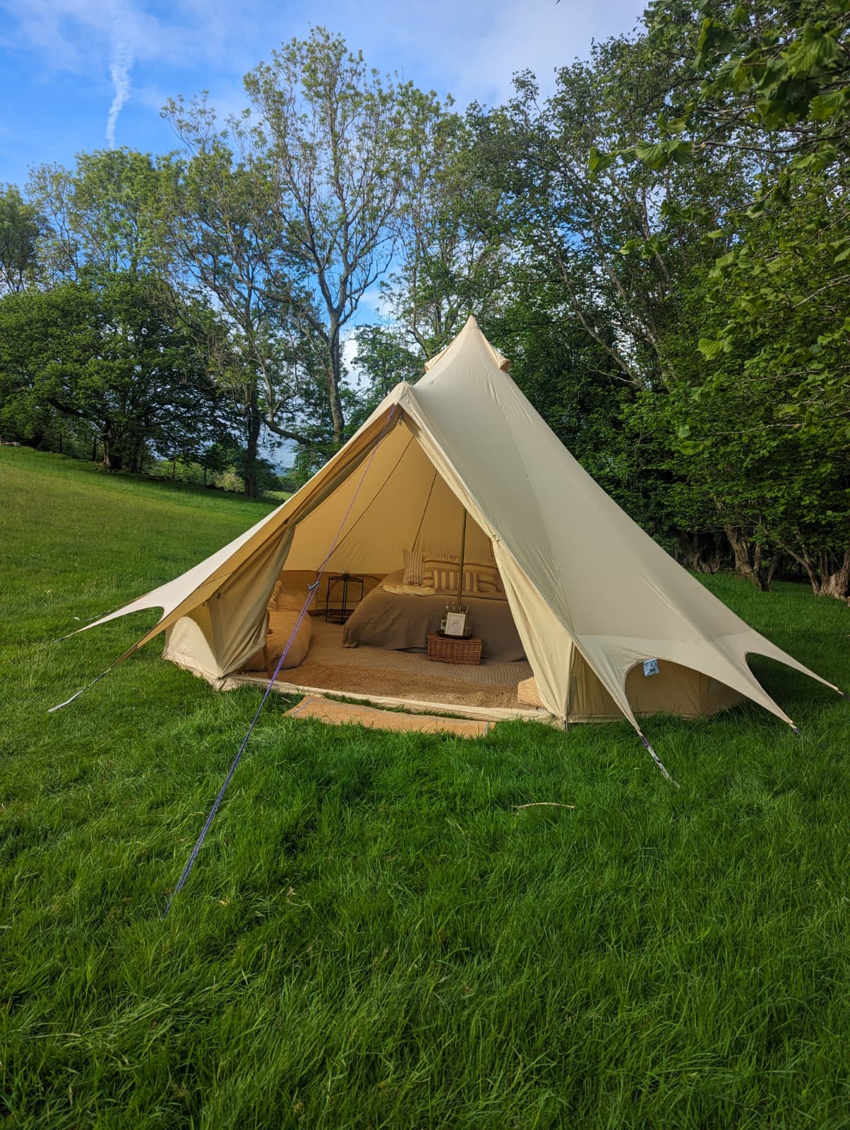 Open front Camp Chic 5m bell tent set up for a private birthday event in Abergavenny South Wales