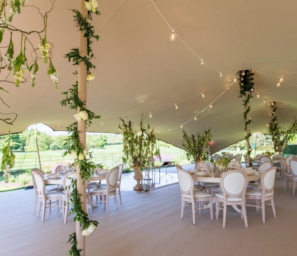 Bright stretch tent wedding interior